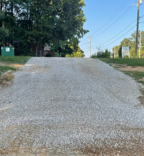 Commercial driveway stone repair fixing erosion and water runoff